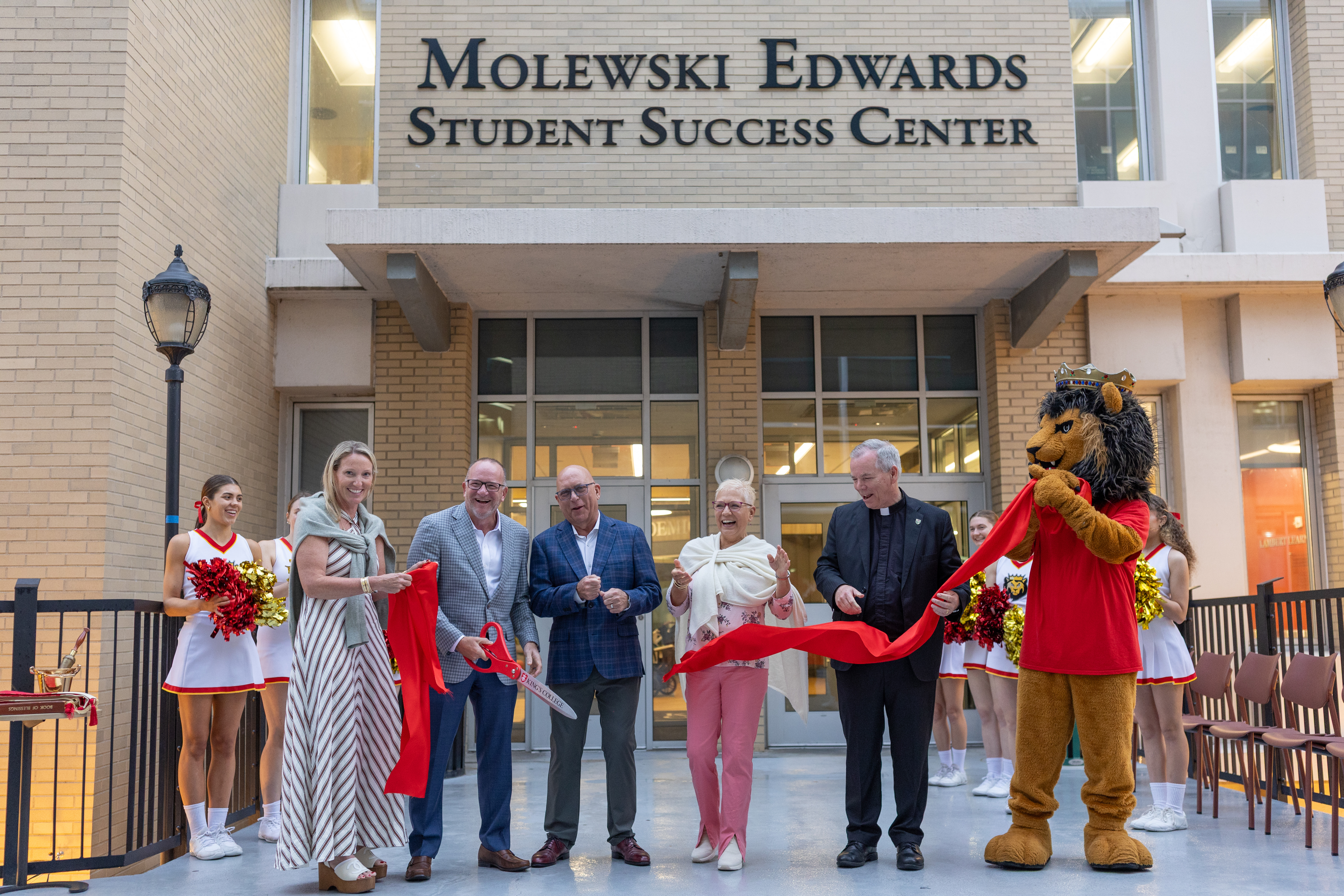 Molewski and Edwards families cutting the Ribbon at the Student Success Center