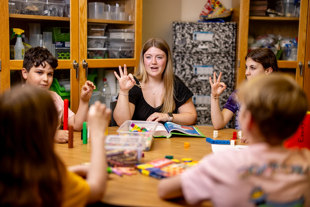 Education professional teaching students.