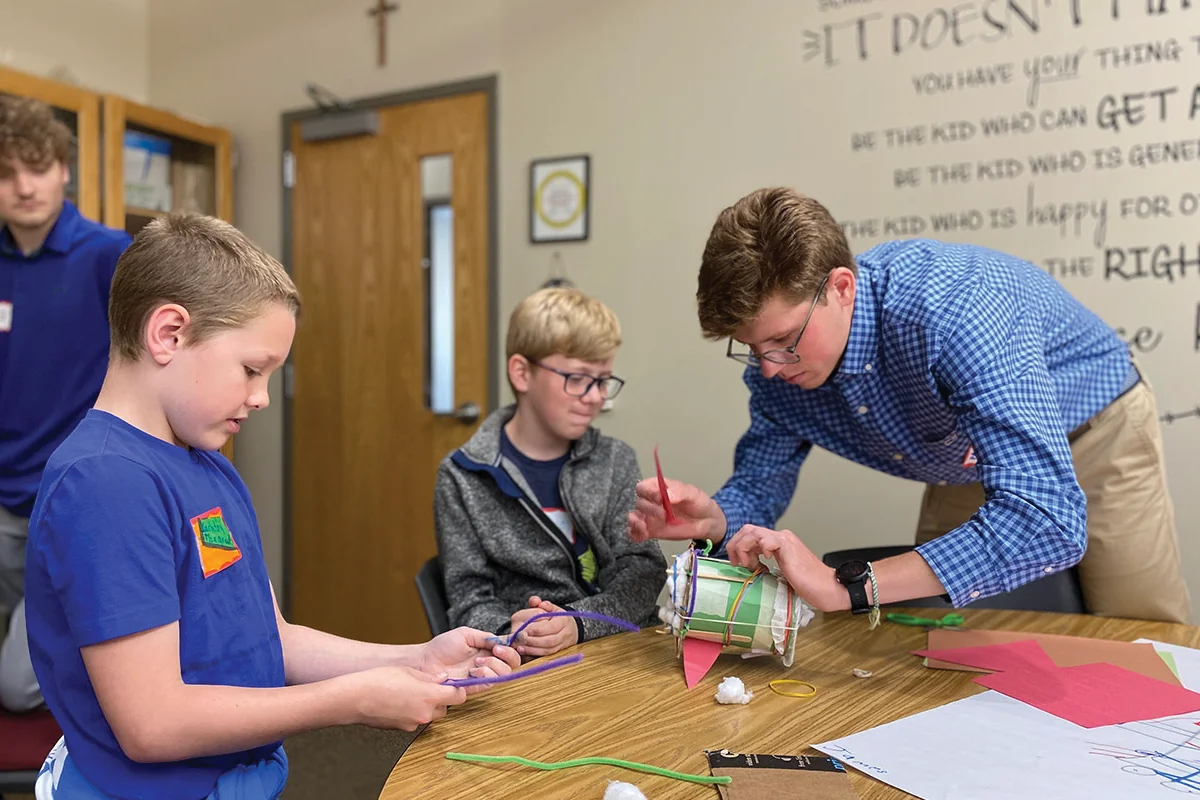 King's teaching candidate working on project with children