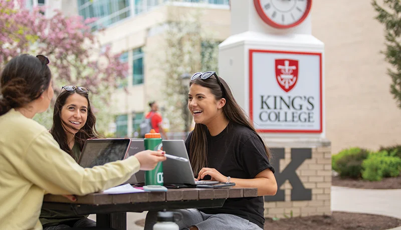 students socializing outdoors