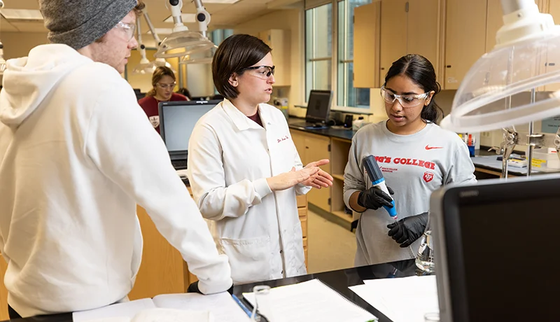 students in labcoats asking what is general science