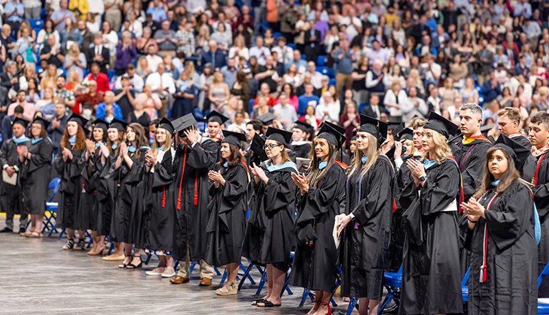graduate students at commencement ceremony