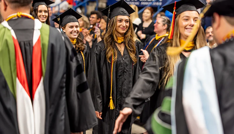 students lining up for commencement