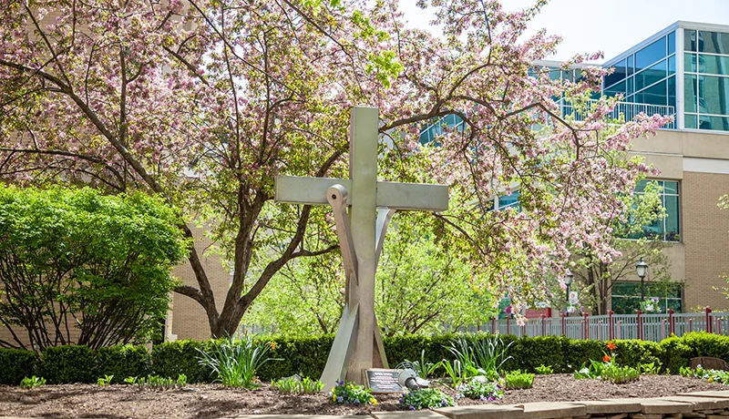 holy cross cross and anchor sculpture