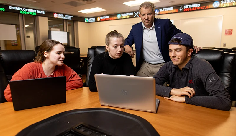 Marketing major students in the business school using laptops