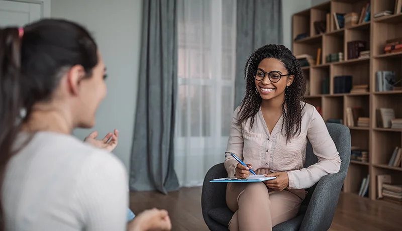 Counselor with a social work degree meeting with a client
