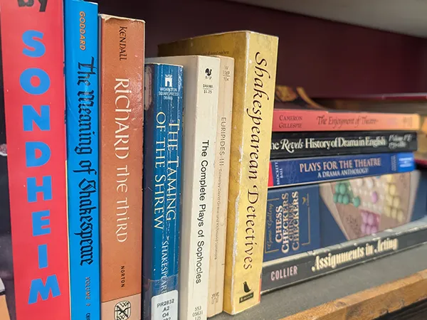 a bookshelf full of vintage books