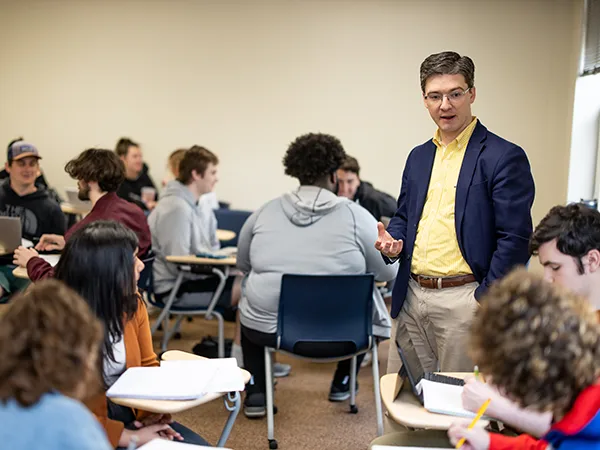 a professor teaching a class, students questioning what can you do with a philosophy degree