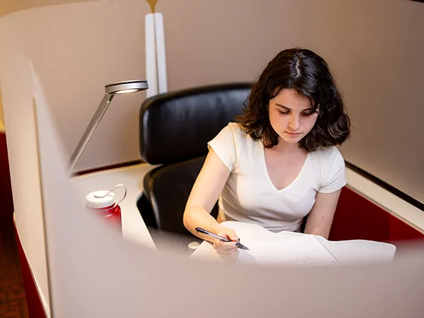a woman studying in an office space