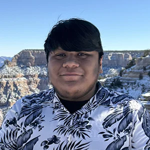 Picture of John smiling at the Grand Canyon