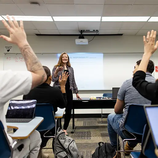 students sitting at desks in class