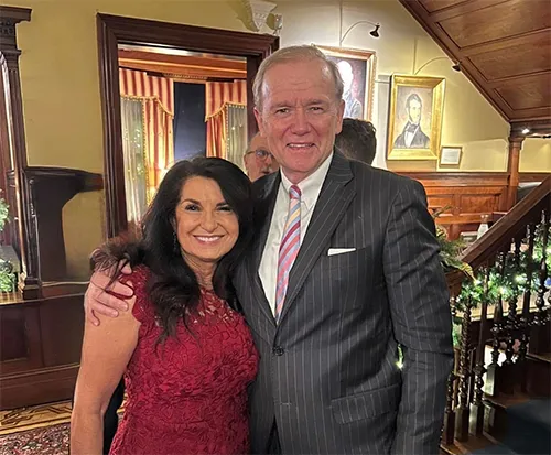 Neil and Cathy posing in formal wear