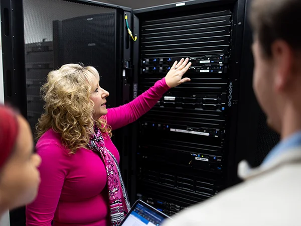 professor instructing computer information systems degree students
