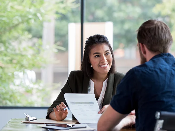finance degree student consulting with a professional