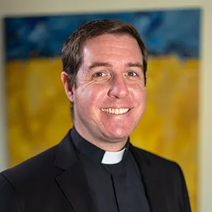 portrait photo of Fr. Chase