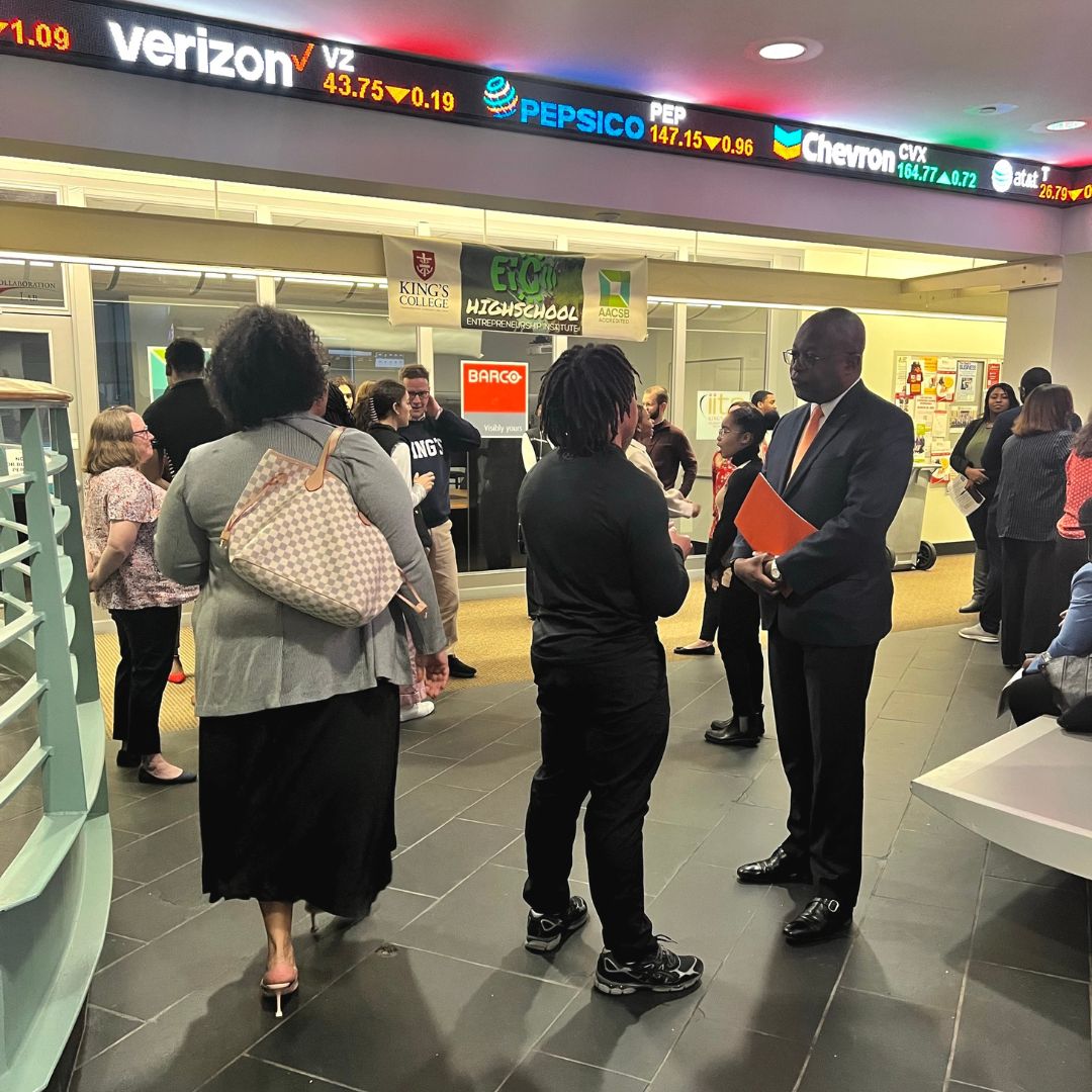 Students networking at event. 