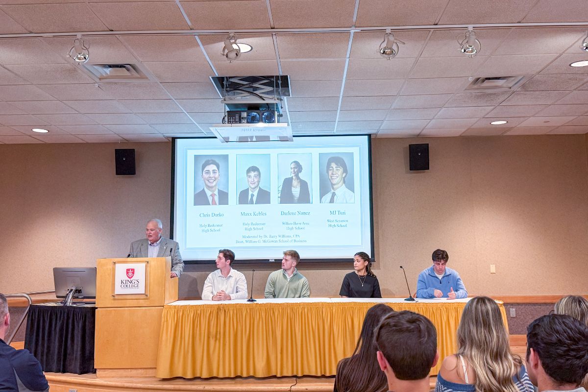 Dean Barry Williams introducing King's student panel