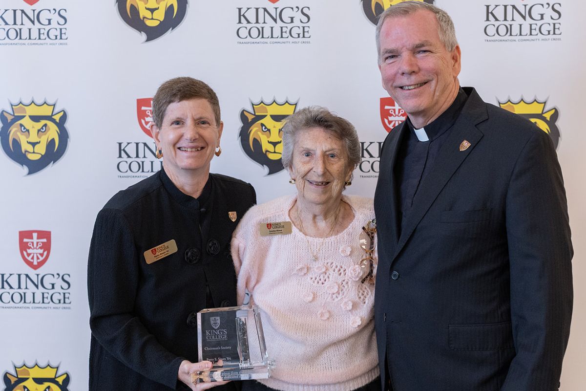 Patty E. Sinex ’84, Emeritus Member of the Board of Directors, Louisa Sinex, and Fr. Looney.