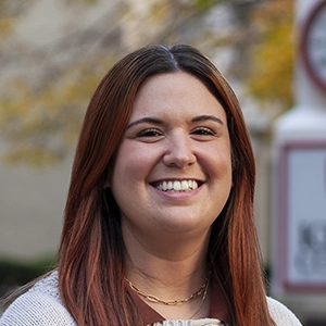 Portrait photo of Julie in professional attire.