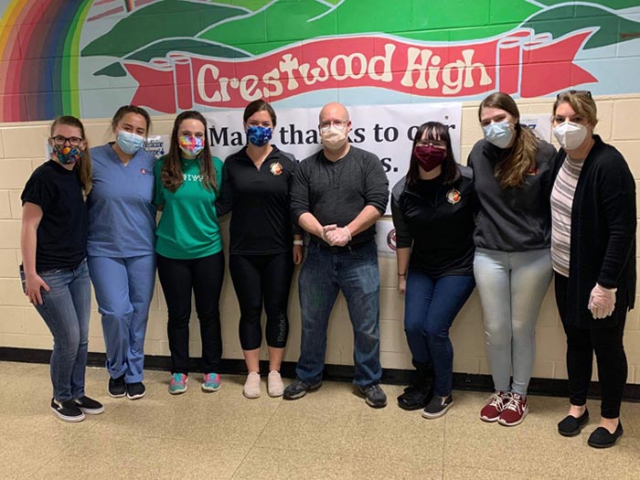 PA students posing in masks