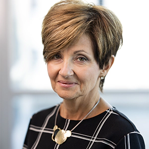 Portrait photo of Diana Hoover in professional attire.