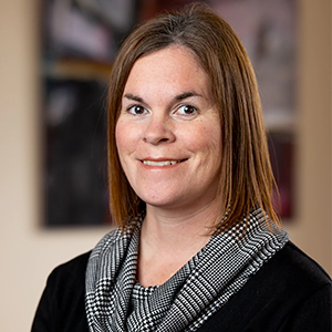 Portrait photo of Kelly Lettieri in professional attire.