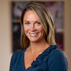 Portrait photo of Kelly Mulhern in professional attire.