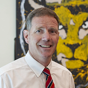 Portrait Photo of Sean Cryan in professional attire. 