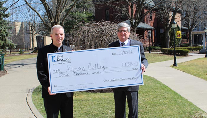 Rev. Thomas P. Looney, C.S.C., Ph.D., President of King’s College and John Dougherty, Assistant Vice President Community Office Manager, First Keystone Community Bank.