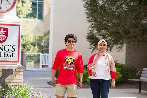 International students walking outdoors.