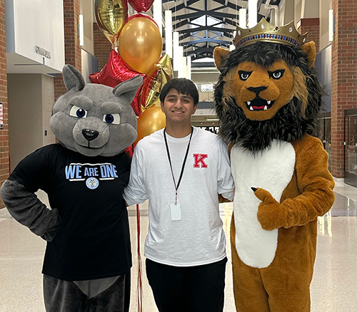photo of Mann with college mascots