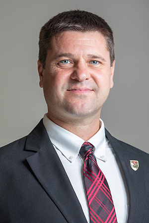 Portrait photo of Gregory K. Janik