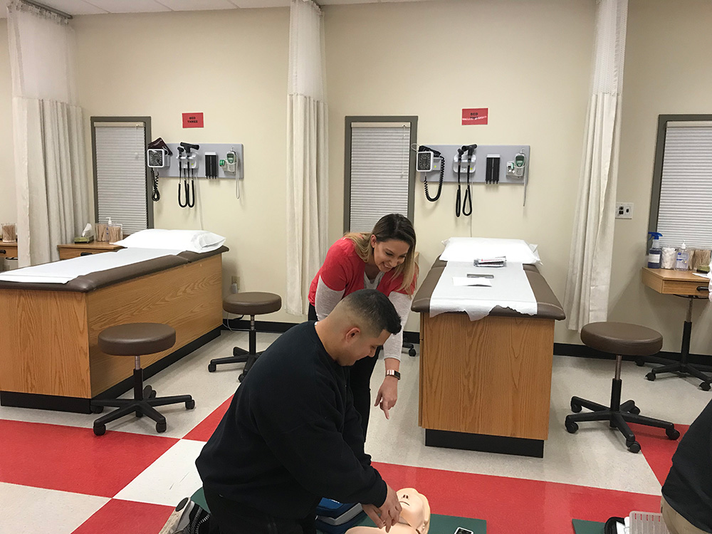 Practicing CPR on a dummy