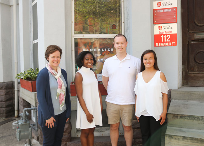 Pictured with Margaret Kowalsky, director of the Study Abroad Program, is, from left, Montgomery, Emmett, and Argiris.