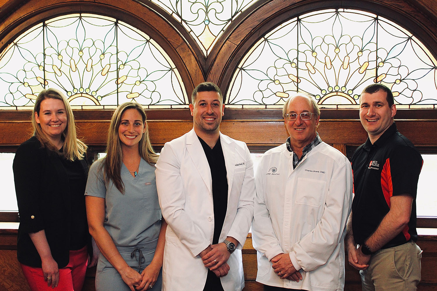 Dentists pose with King's College employees