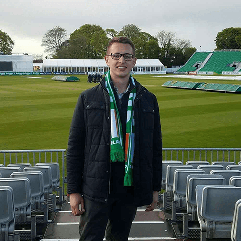 Joshua Frankevich poses in a stadium in Ireland.