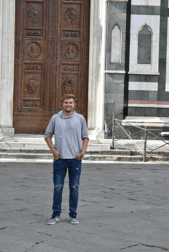 J. Londardi poses for a photo while studying abroad in Italy