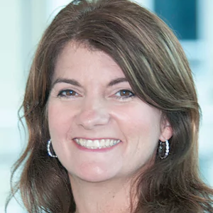 Portrait photo of Christine Stevens in professional attire.